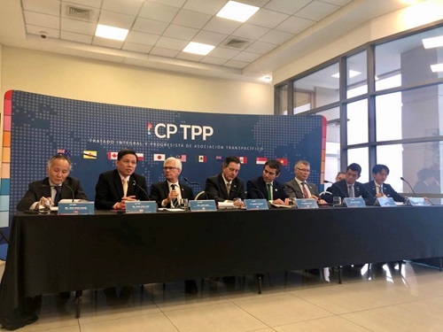 APEC trade ministers pose for a group photo in Viña del Mar, Chile.